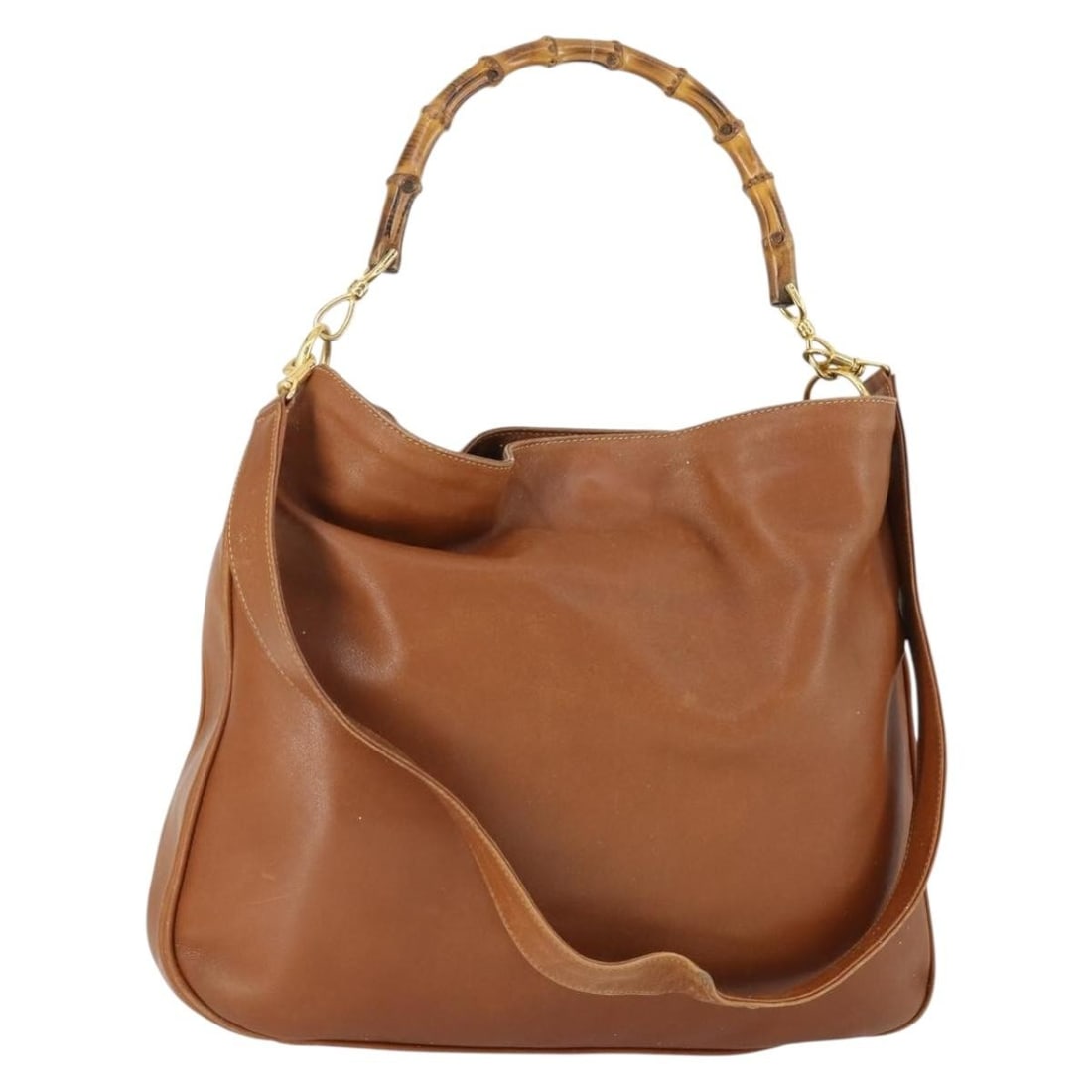 Gucci Bamboo Brown Leather 2way Shoulder and Handbag with Gold Details: Gucci Bamboo Brown Leather 2way Shoulder and Handbag with Gold Details This GUCCI Bamboo Hand Bag offers versatile 2-way styling and is crafted from brown leather with gold-tone accents. The bag featu