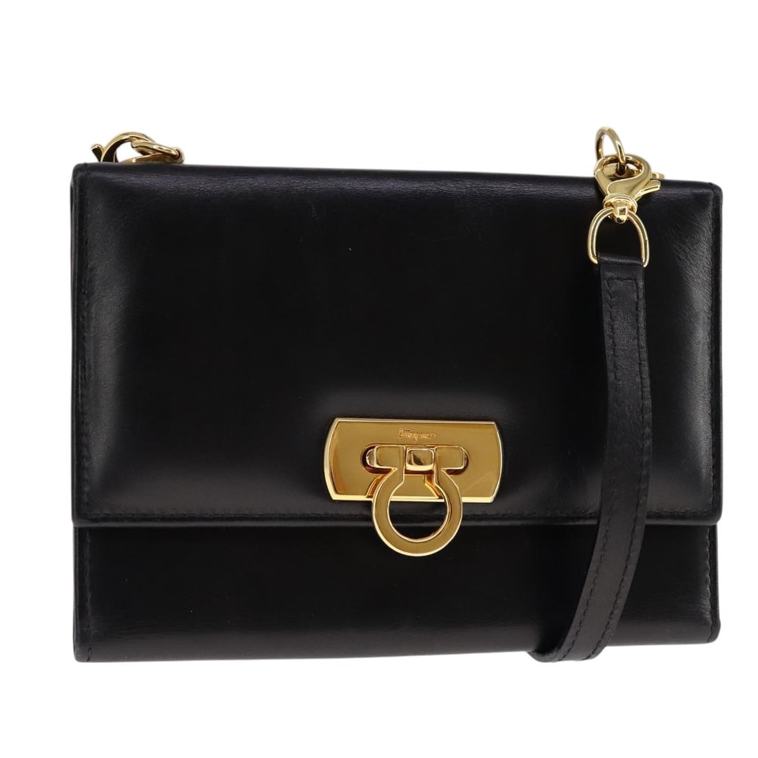 Salvatore Ferragamo Gancini leather shoulder wallet gold black Auth: Salvatore Ferragamo Gancini leather shoulder wallet gold black Auth This Salvatore Ferragamo Gancini shoulder wallet is crafted from leather in a striking gold and black color combination. Designed fo