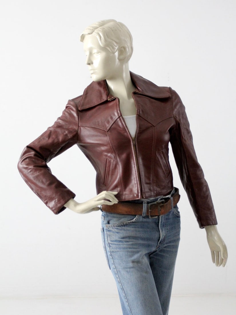 1970s Russet Brown Leather Motorcycle Jacket by Walter Dyer Size 8: 1970s Russet Brown Leather Motorcycle Jacket by Walter Dyer Size 8 This 1970s Walter Dyer leather jacket is crafted from supple russet brown leather in a classic fitted motorcycle silhouette. It featu