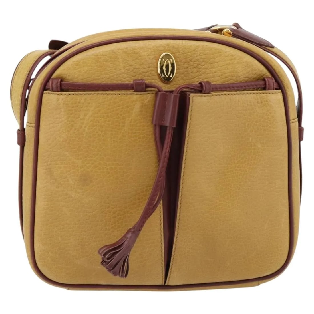 Cartier Must de Cartier Tasseled Leather Shoulder Bag Yellow: Cartier Must de Cartier Tasseled Leather Shoulder Bag Yellow A Must de Cartier tasseled leather bag in yellow with a classic compact silhouette. Made in Spain, this piece is in good overall condition 