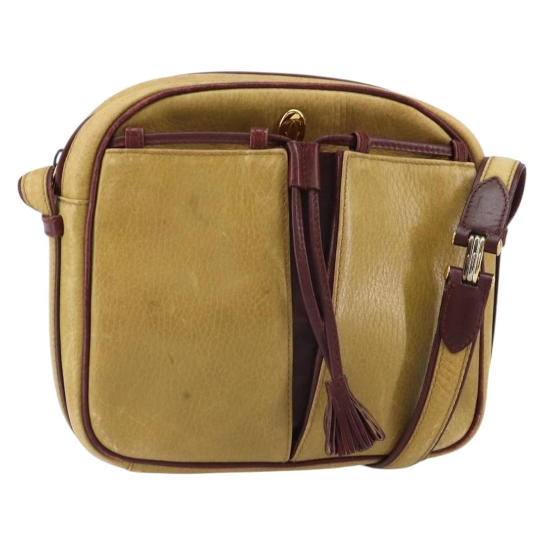Cartier Must Line Leather Shoulder Bag in Yellow Gold Tone: Cartier Must Line Leather Shoulder Bag in Yellow Gold Tone This is a Cartier Must Line shoulder bag crafted from yellow and gold leather. The bag features an adjustable shoulder strap and a compact de