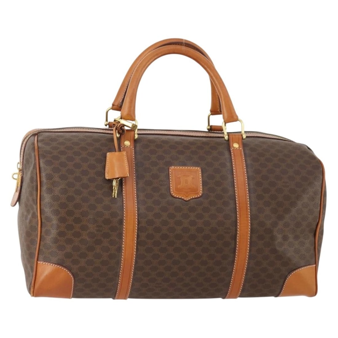 CELINE Macadam Boston Bag Brown PVC Leather with Padlock Keys: CELINE Macadam Boston Bag Brown PVC Leather with Padlock Keys Celine Macadam canvas Boston bag in brown with gold-tone accents, crafted with PVC leather trim. Made in Italy, this women's bag includes 