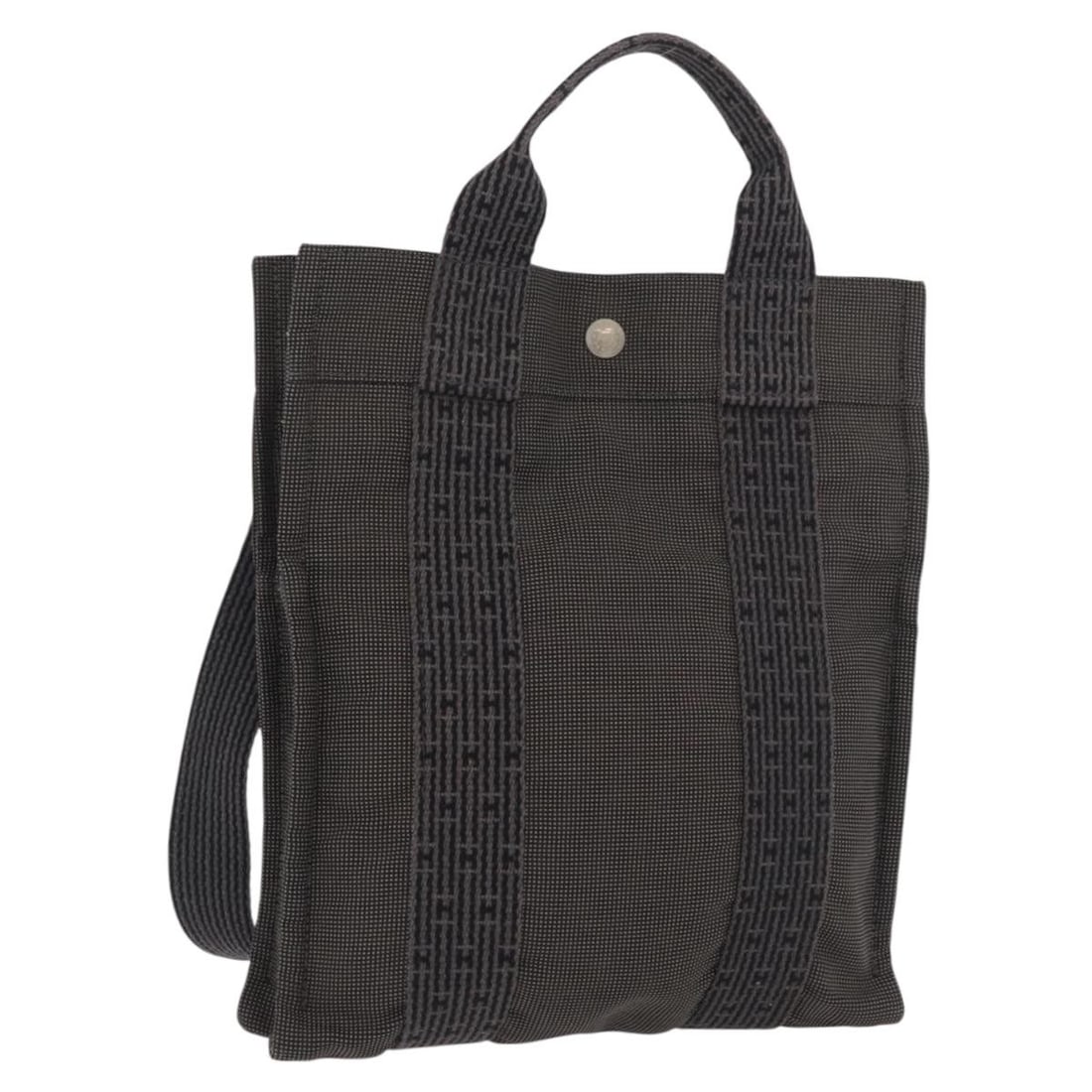 Hermes Her Line PM Canvas Backpack Gray France: Hermes Her Line PM Canvas Backpack Gray France Authentic Hermes Her Line Sac A Dos PM backpack in gray canvas, made in France. This women's backpack shows heavy use, including an out-of-shape exterior