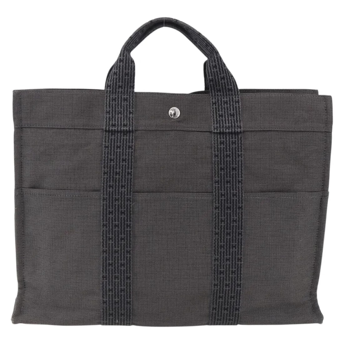 Hermes Fourre-tout Herline gray canvas tote bag 42cm: Hermes Fourre-tout Herline gray canvas tote bag 42cm This Hermes Fourre-tout Herline tote bag is crafted from gray canvas and designed for women. It features a spacious interior with multiple pockets 