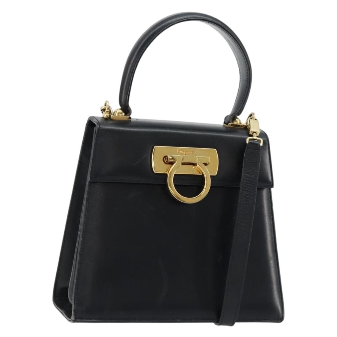 Salvatore Ferragamo Gancini Black Gold Leather 2way Handbag Strap: Salvatore Ferragamo Gancini Black Gold Leather 2way Handbag Strap This Salvatore Ferragamo Gancini handbag is crafted from black leather with gold-tone accents. It offers versatile carrying options wi