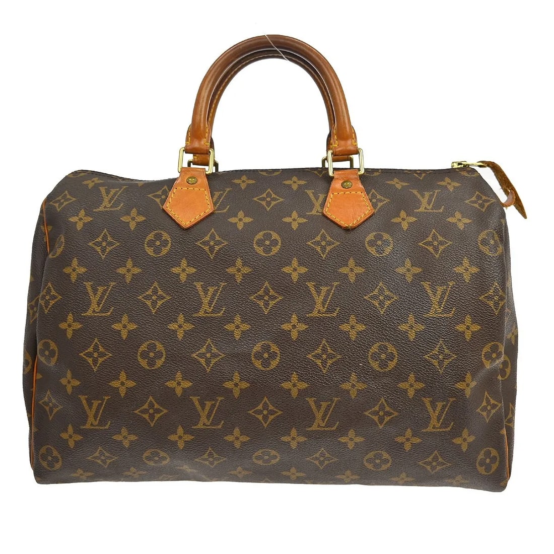 Louis Vuitton Speedy Handbag in Brown Monogram Canvas: Louis Vuitton Speedy Handbag in Brown Monogram Canvas This Louis Vuitton Speedy Handbag features the iconic Monogram Canvas in a classic brown color. Designed for women, it offers a spacious interior 