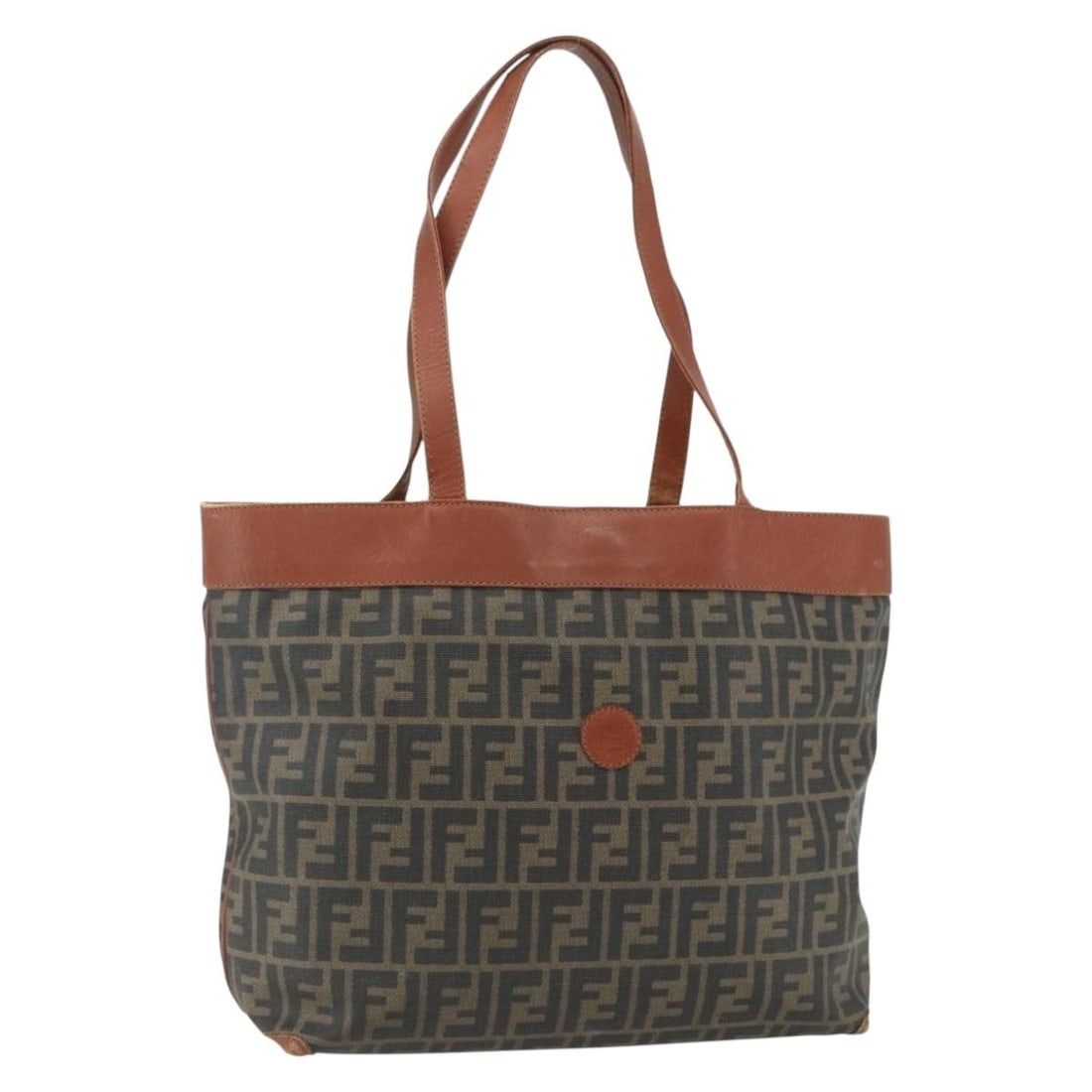 FENDI Zucca Tote Bag PVC Black Brown Made in Italy: FENDI Zucca Tote Bag PVC Black Brown Made in Italy Experience the luxury of FENDI with this stylish Zucca Canvas Tote Bag. Crafted in Italy, this tote features a sophisticated combination of PVC leath