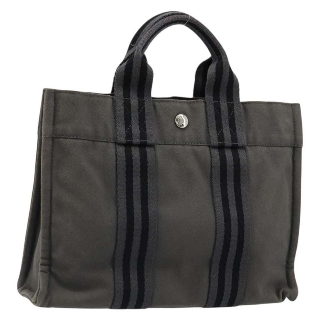 Hermes Fourre Tout PM gray silver cotton handbag: Hermes Fourre Tout PM gray silver cotton handbag This Hermes Fourre Tout PM hand bag is crafted from cotton in a gray and silver color scheme. Designed for women, the bag is made in France and feature
