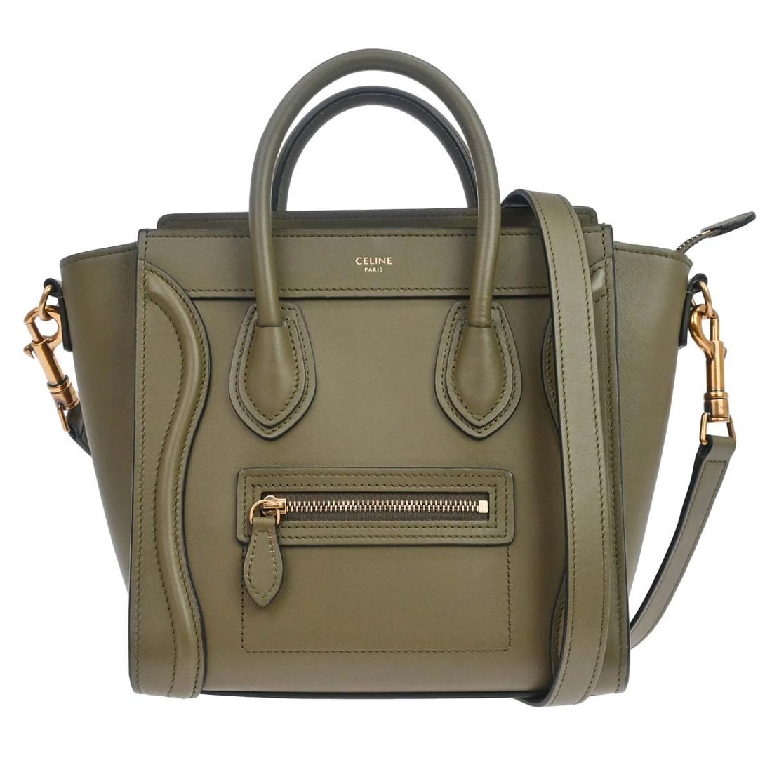 CELINE Nano Luggage Mini Leather Top Handle Bag with Strap Khaki: CELINE Nano Luggage Mini Leather Top Handle Bag with Strap Khaki Celine Nano Luggage 2way handbag in khaki leather with double handles, a zip closure, and logo accents. This mini top handle bag includ