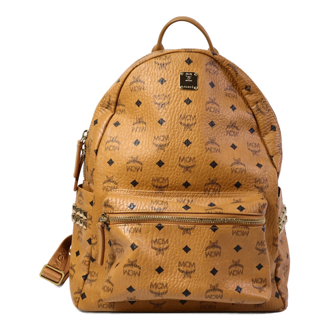 MCM MMK6SVE38CO001 Brown Coated Canvas Rucksack Backpack: MCM MMK6SVE38CO001 Brown Coated Canvas Rucksack Backpack This MCM rucksack backpack features a brown PVC coated canvas exterior and gold-tone hardware. Designed for women, it offers a spacious interio