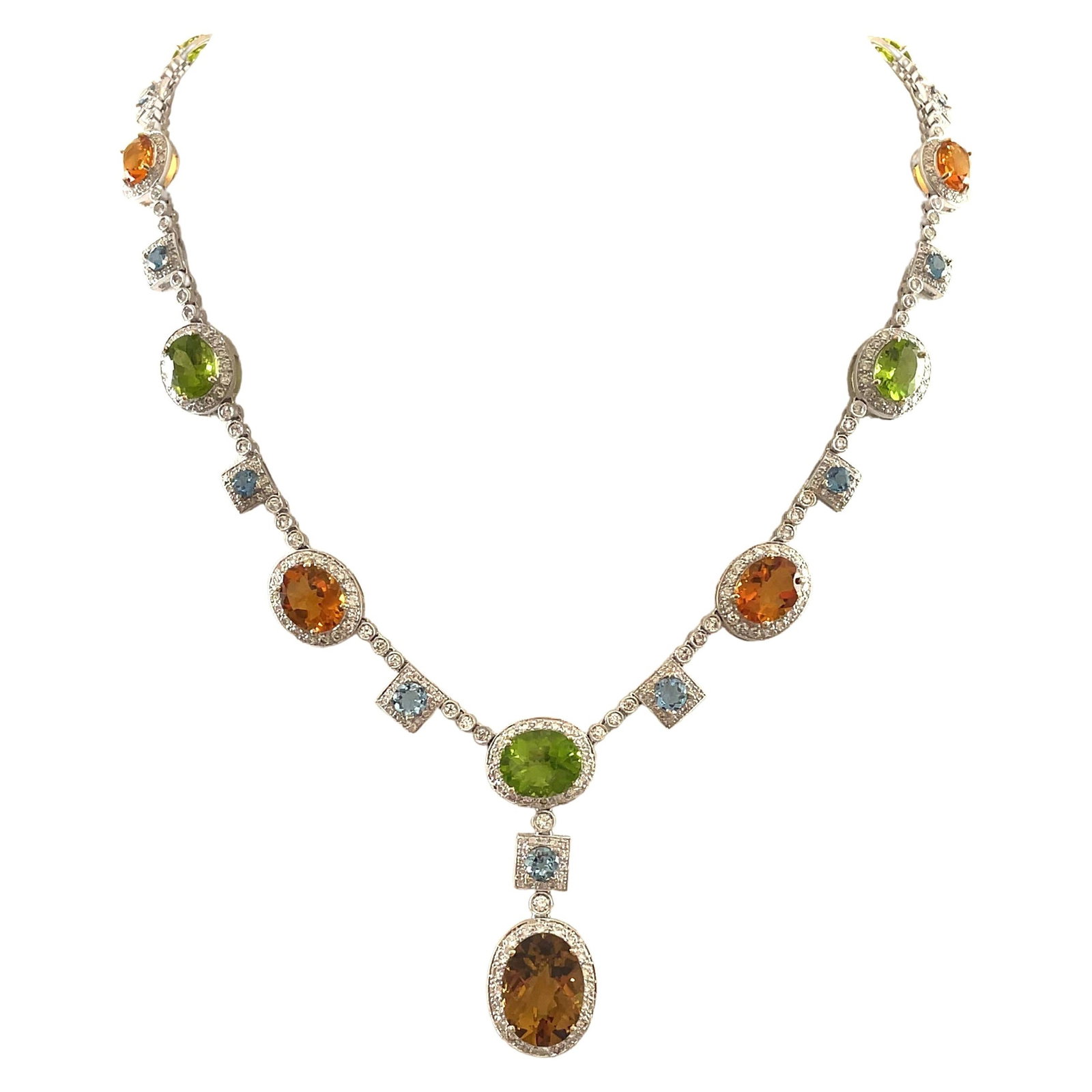 50.40ct Multi Gemstone Necklace in 18k White Gold Contemporary Design: 50.40ct Multi Gemstone Necklace in 18k White Gold Contemporary Design This exquisite necklace features a stunning array of gemstones, including 50.40 carats of beautifully cut diamonds, aquamarines, p