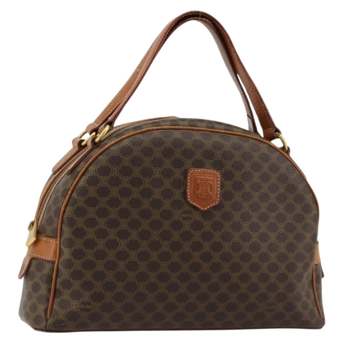 CELINE Macadam Canvas Brown PVC Leather Handbag Italy: CELINE Macadam Canvas Brown PVC Leather Handbag Italy Celine Macadam canvas hand bag in brown with gold-tone accents, made in Italy. This women's bag is crafted from PVC leather and Macadam canvas. It