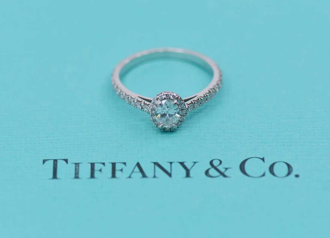 Tiffany & Co 0.35ct F/VVS1 Oval Diamond Engagement Ring Platinum: Tiffany & Co 0.35ct F/VVS1 Oval Diamond Engagement Ring Platinum This exquisite Tiffany & Co. engagement ring features a stunning 0.35 carat oval diamond with F color and VVS1 clarity, set in luxuriou