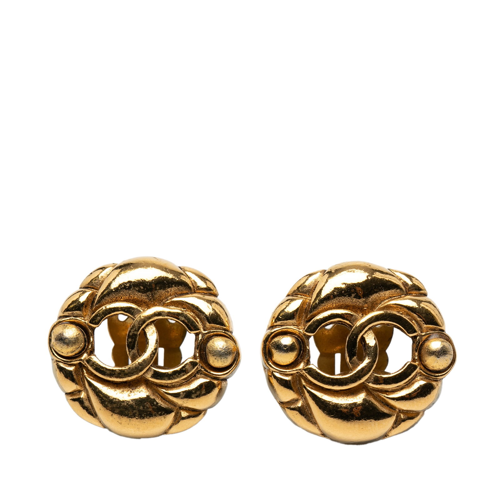 Chanel Round Gold Tone Metal Clip On Earrings: Chanel Round Gold Tone Metal Clip On Earrings These Chanel CC round clip-on earrings feature gold tone metal bodies with back clip-on closures. Made in France, these costume earrings display the signa