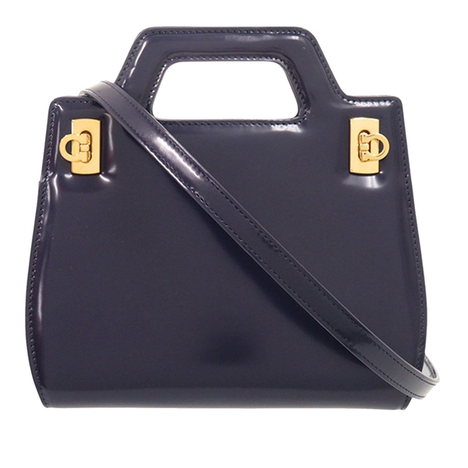 Ferragamo Wanda Mini Blue Brushed Calfskin Top Handle Satchel: Ferragamo Wanda Mini Blue Brushed Calfskin Top Handle Satchel Ferragamo Mini Brushed Calfskin Wanda Top Handle Bag in blue leather with cut-out handles and a detachable flat leather shoulder strap.