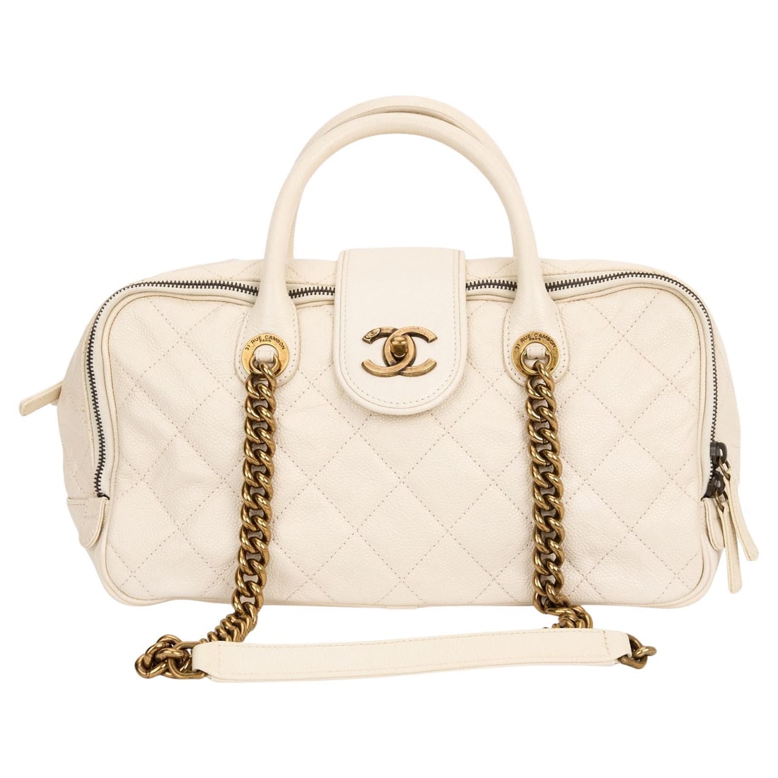 Chanel Cream Caviar Shiva Bowling Bag with Burgundy Interior: Chanel Cream Caviar Shiva Bowling Bag with Burgundy Interior Elevate your style with the Chanel Cream Gold Shiva Bowling Bag, a stunning piece from the Bombay collection. Crafted from crinkled cream c