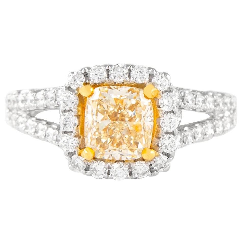 1.97ct Fancy Yellow VS1 Diamond Ring 18k Gold: 1.97ct Fancy Yellow VS1 Diamond Ring 18k Gold This exquisite ring showcases a stunning 1.51-carat cushion cut Fancy Yellow diamond, graded VS1 for clarity by EGL. Set in a contemporary design, the rin
