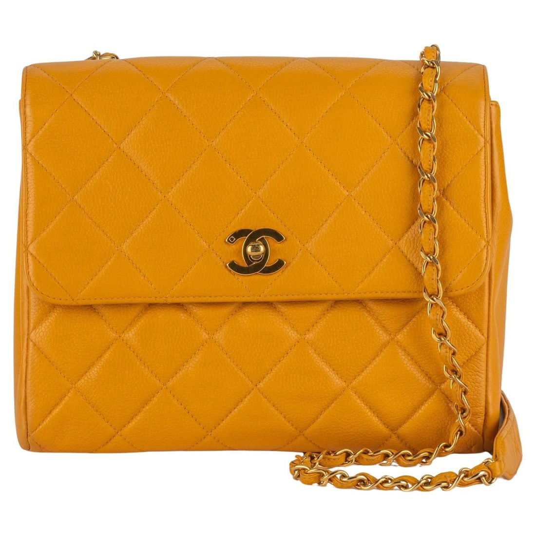 Chanel Mustard Turn-Lock Chain Bag with Authenticity Card: Chanel Mustard Turn-Lock Chain Bag with Authenticity Card The Chanel Turn-Lock Chain Bag in a vibrant mustard color is a stylish and functional accessory. It features a classic CC closure and an elega
