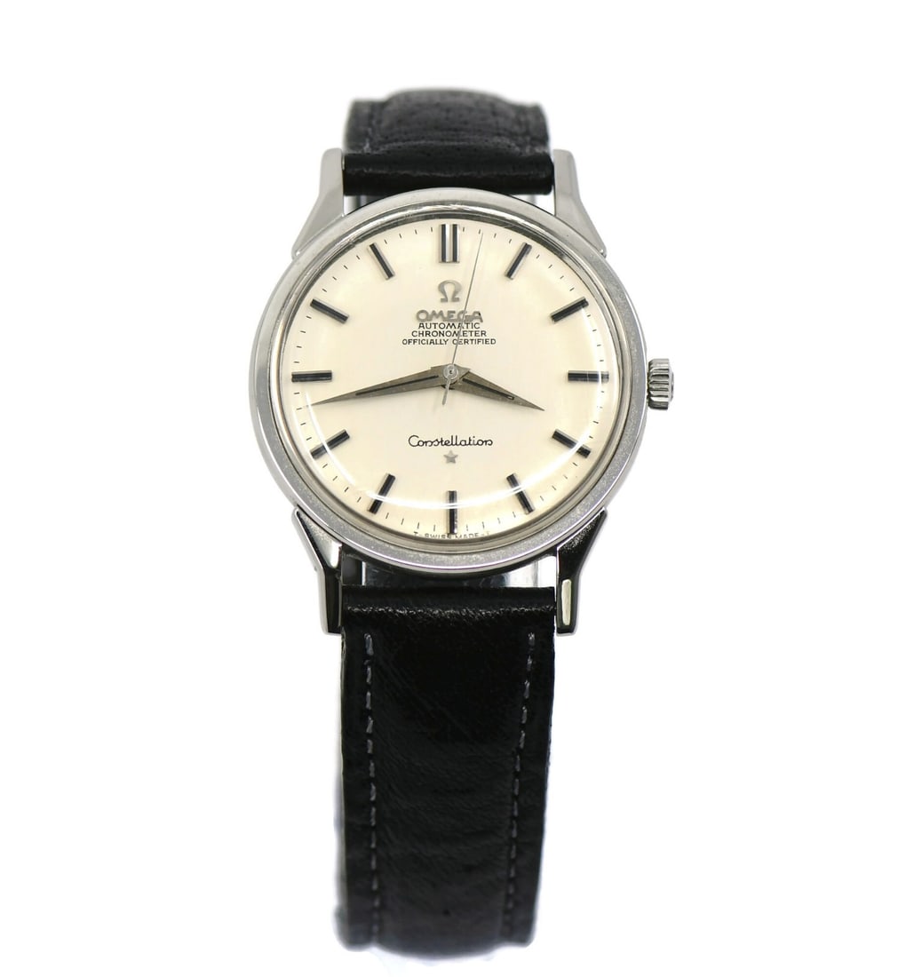 OMEGA Constellation Stainless Steel Automatic Watch 167005 with Box and Papers: OMEGA Constellation Stainless Steel Automatic Watch 167005 with Box and Papers This Omega Constellation wristwatch combines elegance and functionality. Featuring a polished stainless steel case measur