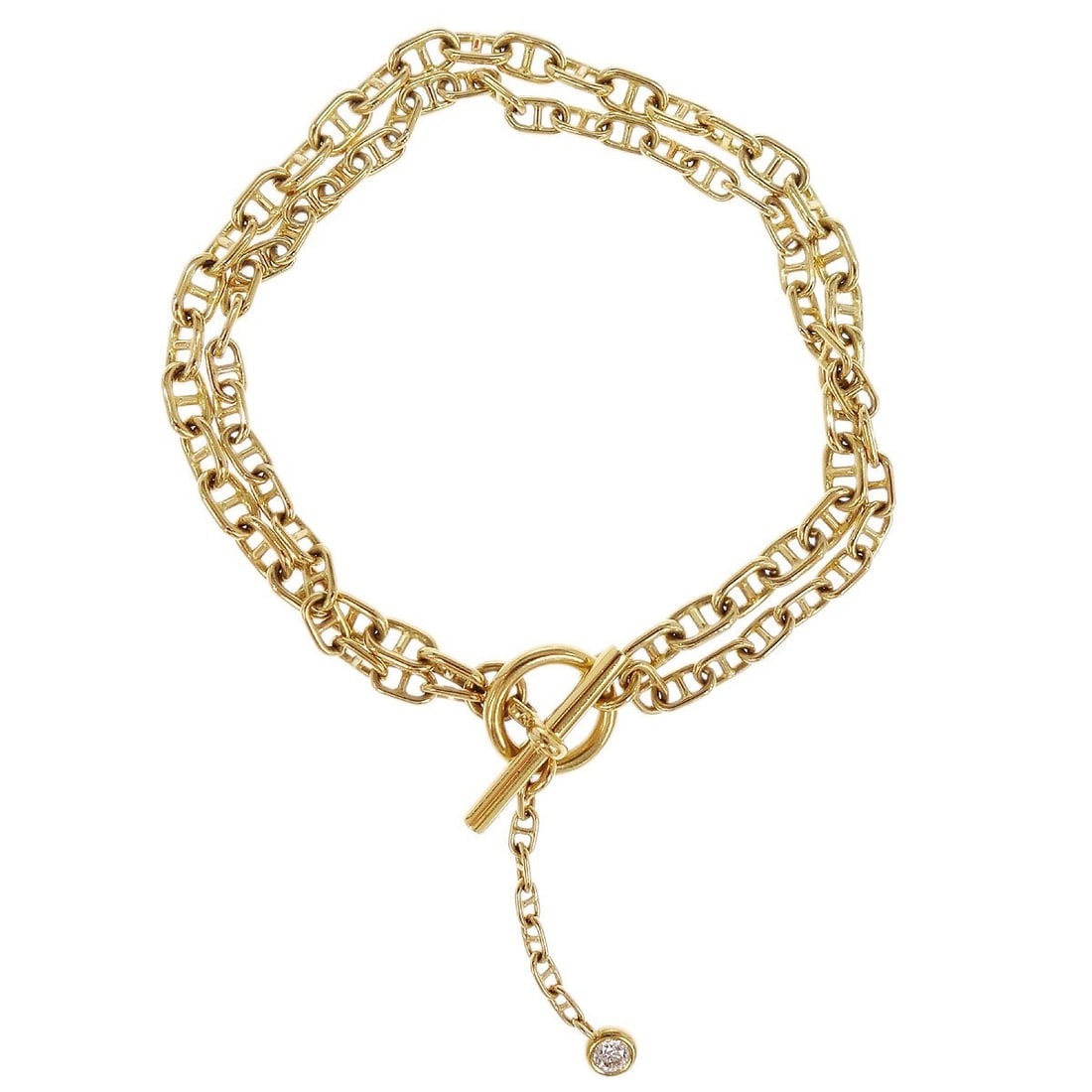 Hermes Chaine d'Ancre diamond bracelet in Au750 gold: Hermes Chaine d'Ancre diamond bracelet in Au750 gold Hermes Chaine d'Ancre double chain bracelet crafted in Au750 yellow gold and set with diamond accents. Made in France, this chain-style bracelet in