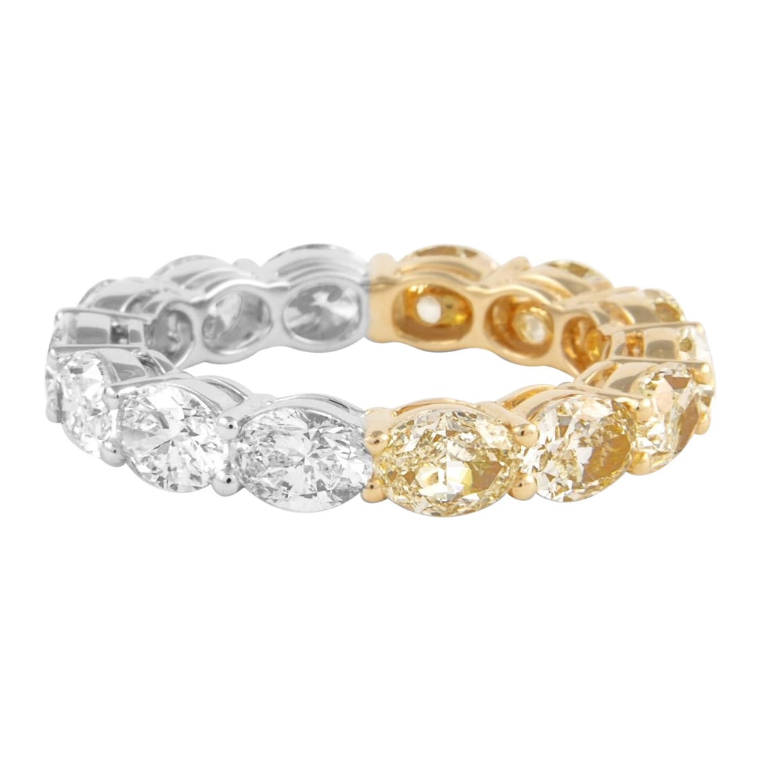 5.11ct Oval Yellow White Diamond Eternity Band 18k Gold: 5.11ct Oval Yellow White Diamond Eternity Band 18k Gold This exquisite eternity band features a stunning combination of oval cut yellow and white diamonds. With a total diamond weight of 5.11 carats, 