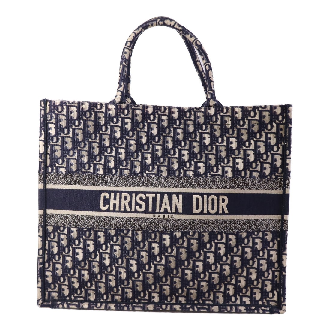 Dior Book Tote Large Blue Canvas Handbag M1296 France: Dior Book Tote Large Blue Canvas Handbag M1296 France This Christian Dior CD tote bag features a blue canvas exterior and is designed in a classic tote style. Made in France, it offers ample space and