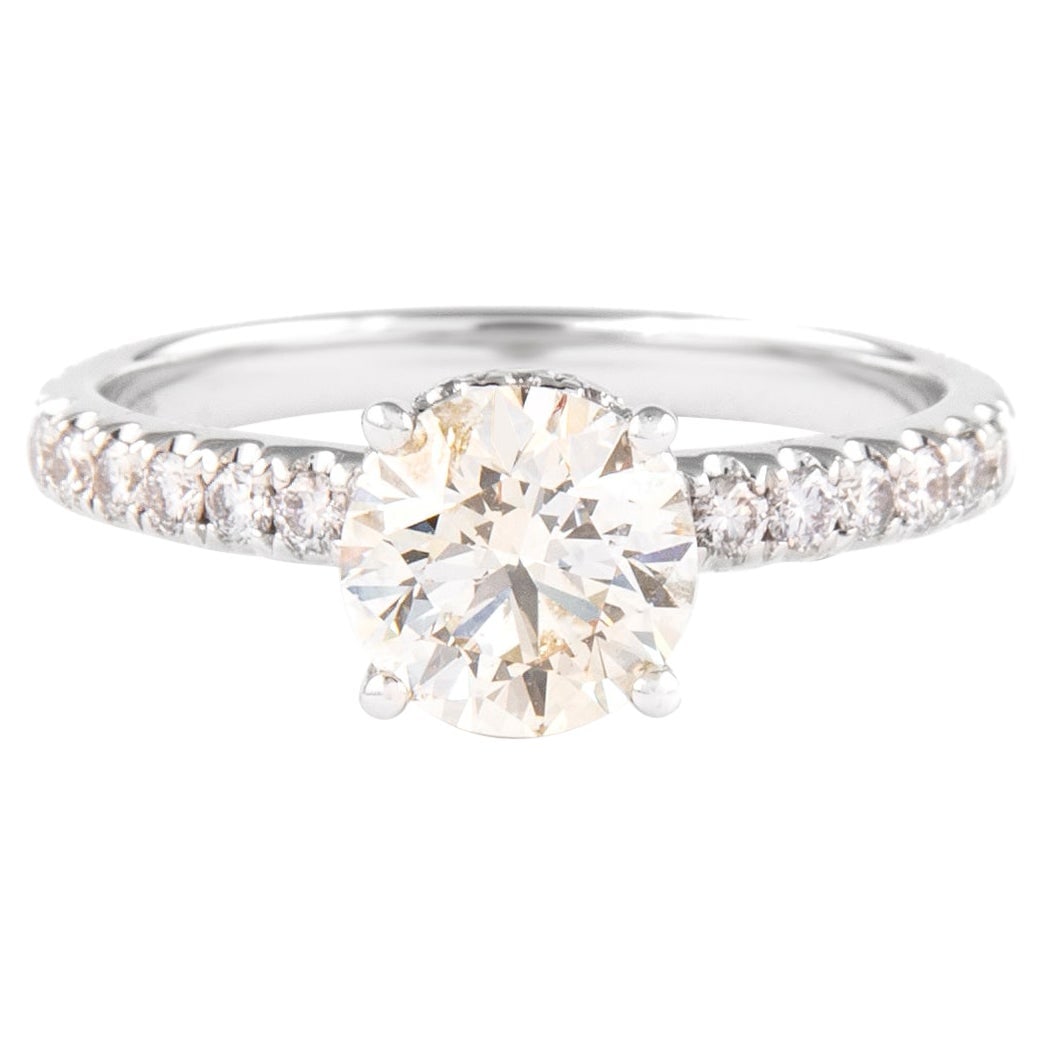 EGL Certified 1.20 Carat Diamond Ring in 18K White Gold: EGL Certified 1.20 Carat Diamond Ring in 18K White Gold This stunning EGL certified solitaire diamond engagement ring features a captivating 1.20 carat round brilliant diamond set in luxurious 18-kara