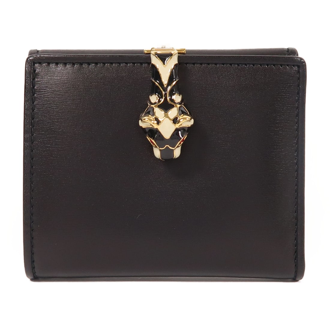 GUCCI GG Bi-fold Wallet Black Calfskin GHW Italy: GUCCI GG Bi-fold Wallet Black Calfskin GHW Italy This exquisite GUCCI bi-fold wallet is crafted from premium black calfskin leather, ensuring a luxurious feel and durability. Designed with practicalit