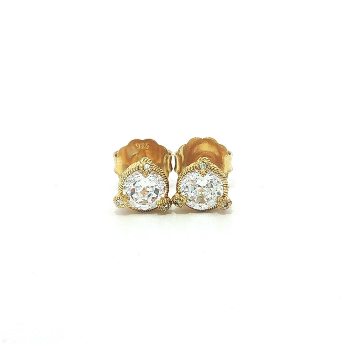 Judith Ripka sterling silver gold plated CZ stud earrings butterfly backs: Judith Ripka sterling silver gold plated CZ stud earrings butterfly backs These Judith Ripka stud earrings feature a sophisticated design crafted from solid sterling silver with yellow gold plating. E
