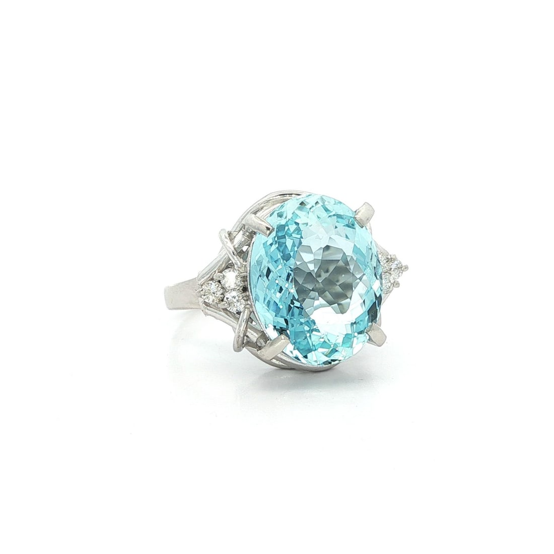Platinum Cocktail Ring 5.59ctw Oval Blue Aquamarine with Diamond Accents: Platinum Cocktail Ring 5.59ctw Oval Blue Aquamarine with Diamond Accents This stunning cocktail ring showcases a large, oval natural aquamarine at its center, measuring approximately 13.6 x 10.7 mm an
