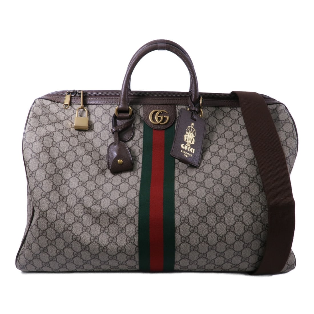 Gucci Ophidia GG Large Brown Coated Canvas Duffle Bag: Gucci Ophidia GG Large Brown Coated Canvas Duffle Bag This Gucci Ophidia GG large duffle bag features a two-way shoulder design, crafted from brown PVC coated canvas with gold-tone hardware. The bag o