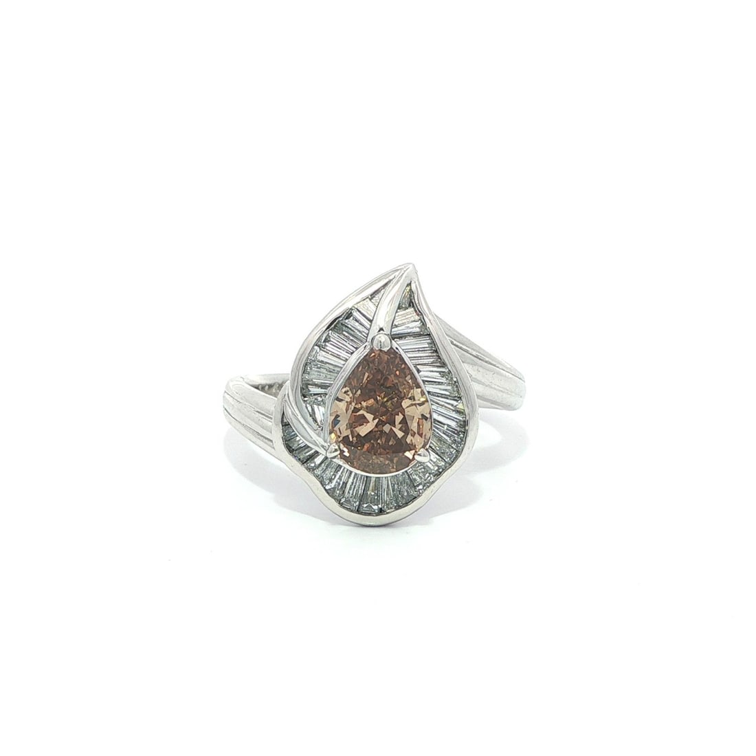 Platinum 1.77ctw Pear Fancy Orangy Brown Diamond Leaf Ring: Platinum 1.77ctw Pear Fancy Orangy Brown Diamond Leaf Ring This exquisite Platinum Ring features a stunning 1.77 carat total weight, showcasing a pear-shaped fancy orangy brown diamond at its center. 