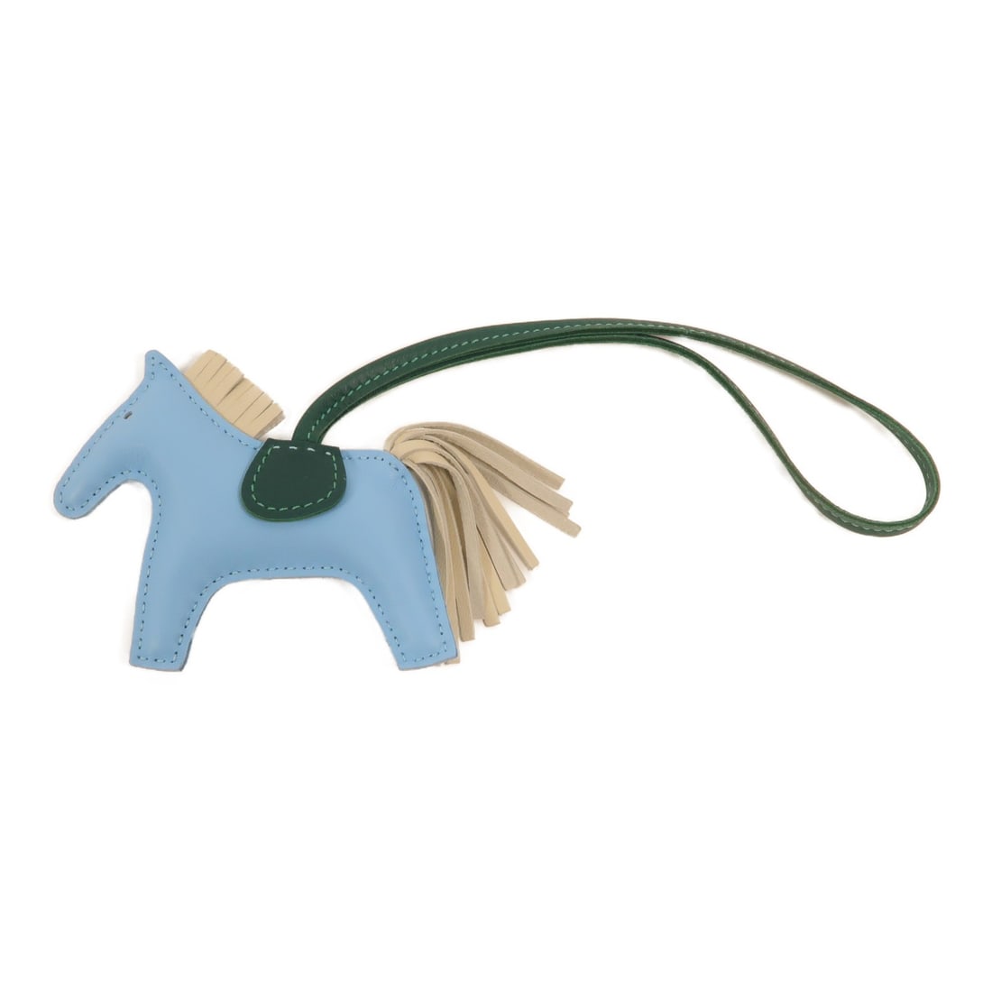 Hermes Rodeo PM Celeste Lambskin Charm: Hermes Rodeo PM Celeste Lambskin Charm This Hermes Rodeo PM Charm is crafted from Agneau Milo lambskin leather in a blue color. Designed as a stylish accessory, it is suitable for unisex use. Made in 