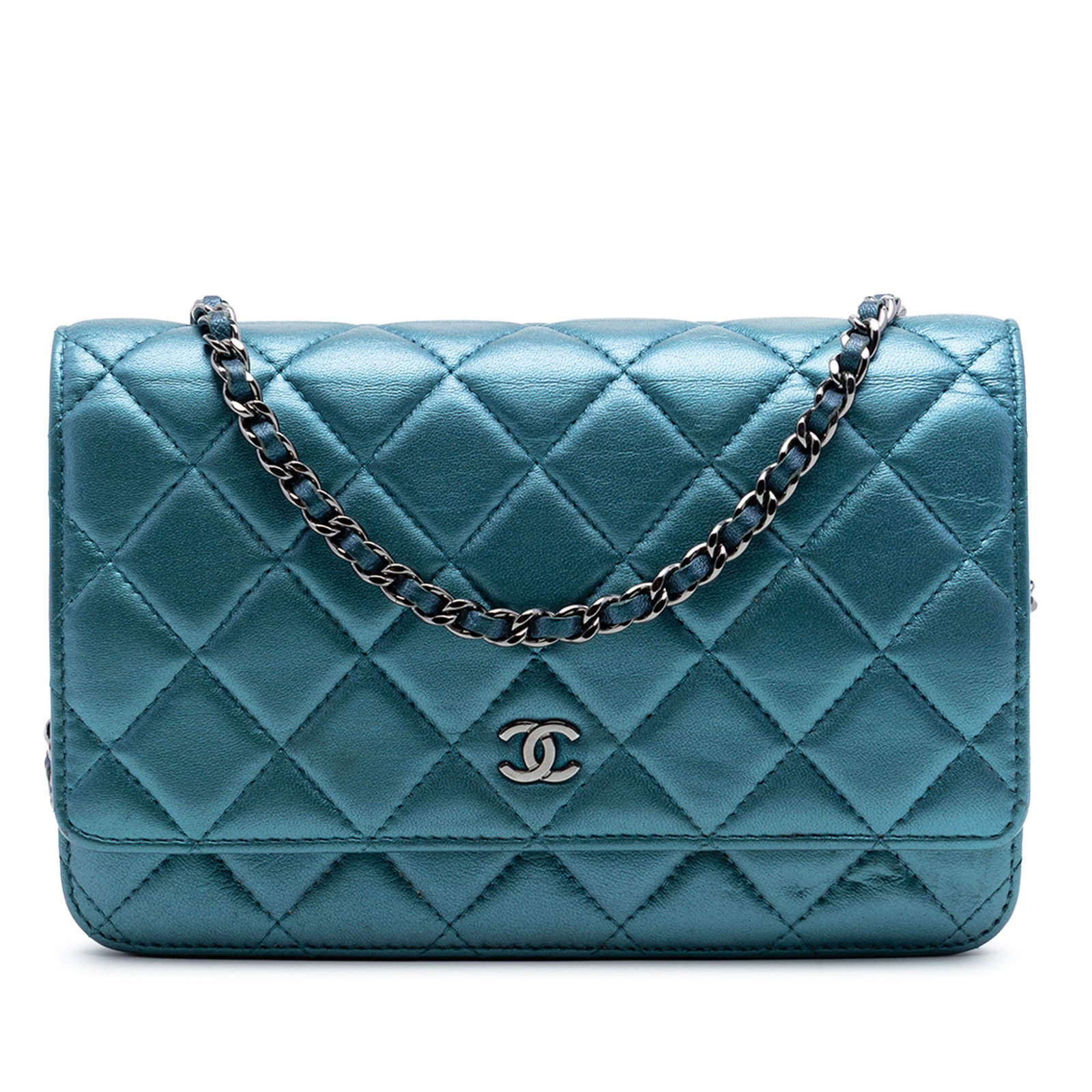 Chanel blue quilted metallic lambskin wallet on chain: Chanel blue quilted metallic lambskin wallet on chain This Chanel CC Quilted Metallic Lambskin Wallet On Chain is crafted from quilted lambskin leather in a metallic blue finish. It features a leather