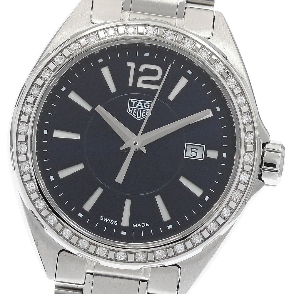 TAG Heuer Formula 1 Diamond Bezel Quartz Ladies Watch WBJ1416: TAG Heuer Formula 1 Diamond Bezel Quartz Ladies Watch WBJ1416 This TAG Heuer Formula 1 women's wristwatch features a blue dial and a diamond bezel, offering a blend of elegance and sporty design. The 
