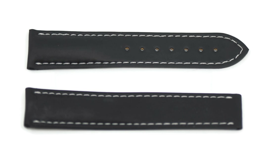 Authentic Omega Black Leather Wristwatch Strap 20mm: Authentic Omega Black Leather Wristwatch Strap 20mm This authentic Omega black leather strap is designed specifically for wristwatches, offering a sleek and sophisticated addition to your timepiece. W