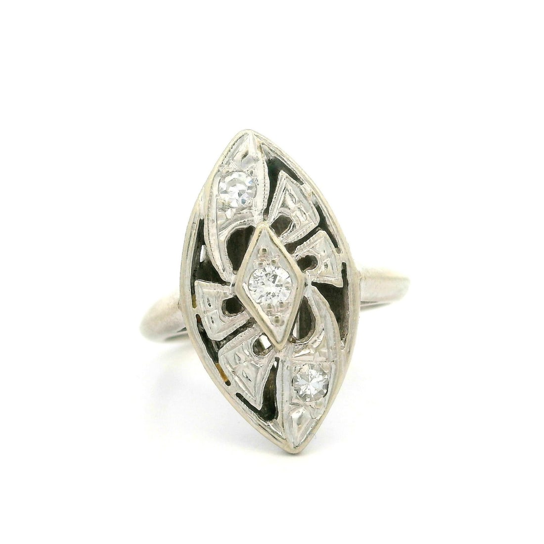 Vintage Mid Century 12k White Gold Diamond Navette Cocktail Ring: Vintage Mid Century 12k White Gold Diamond Navette Cocktail Ring This stunning Vintage Mid Century Cocktail Ring features a unique marquise shape adorned with three natural genuine diamonds. The diamo