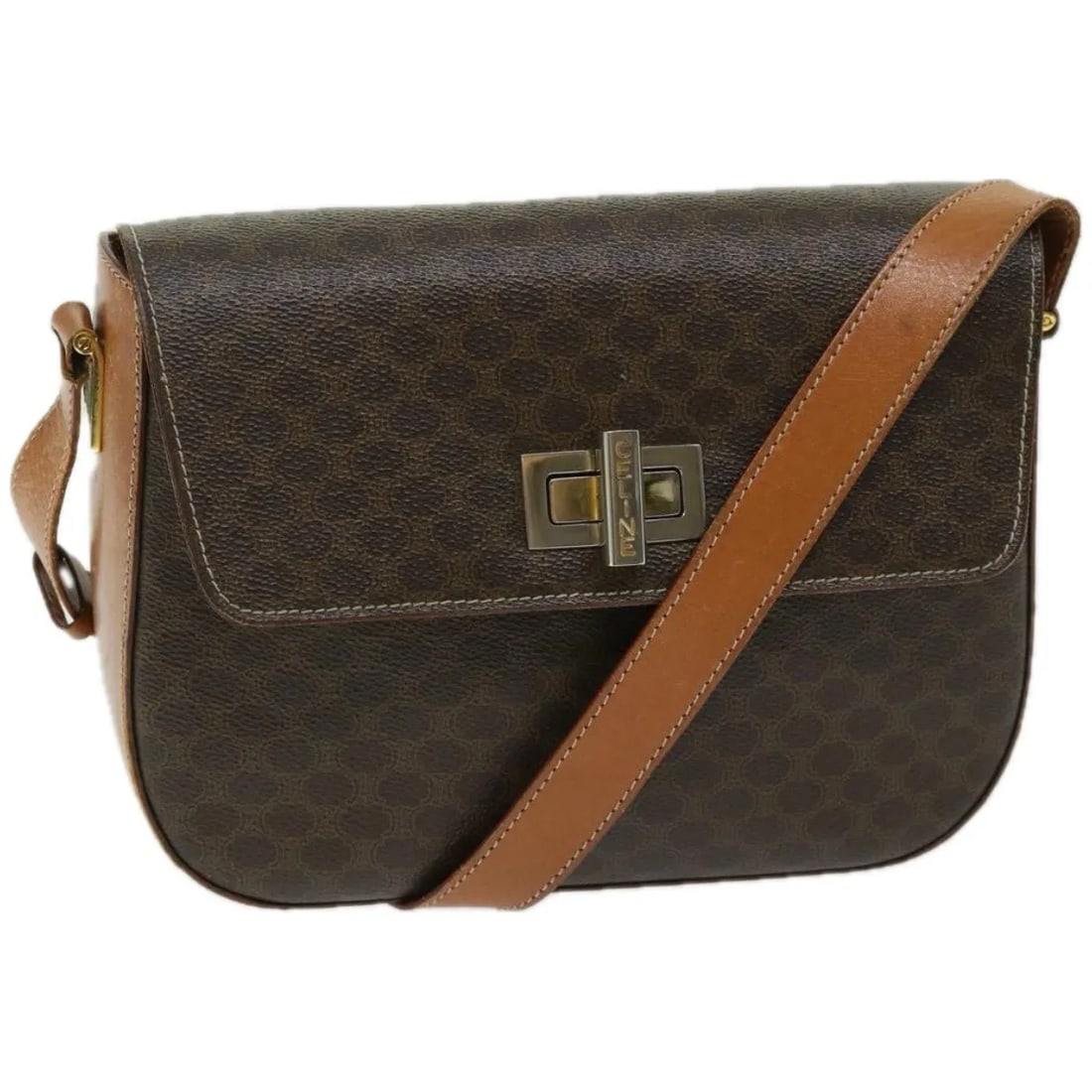 Celine Vintage Macadam shoulder bag in brown canvas leather: Celine Vintage Macadam shoulder bag in brown canvas leather This Celine Vintage Macadam Shoulder Bag is crafted from brown canvas with leather accents. Made in Italy, it features the iconic Macadam pa