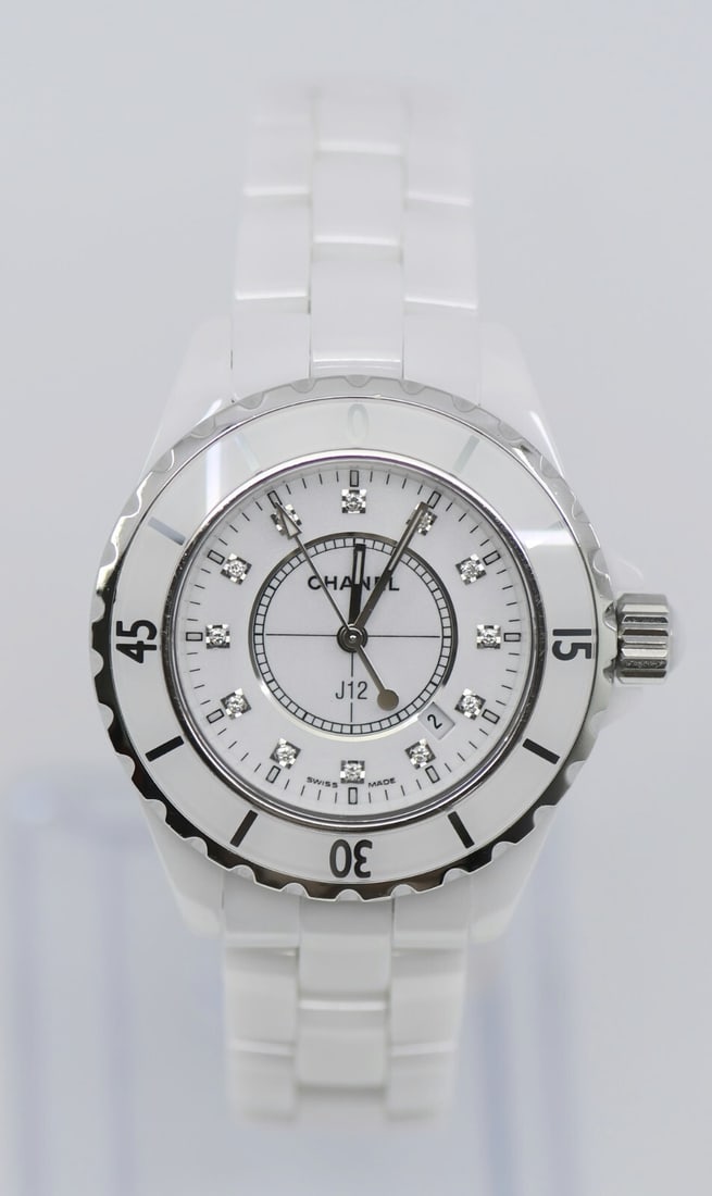 Chanel J12 Diamond Watch H1628 White Ceramic 33mm Authentic: Chanel J12 Diamond Watch H1628 White Ceramic 33mm Authentic The Chanel J12 Diamond White Ceramic Watch H1628 is a stunning wristwatch that combines luxury and elegance. Featuring a sleek white ceramic