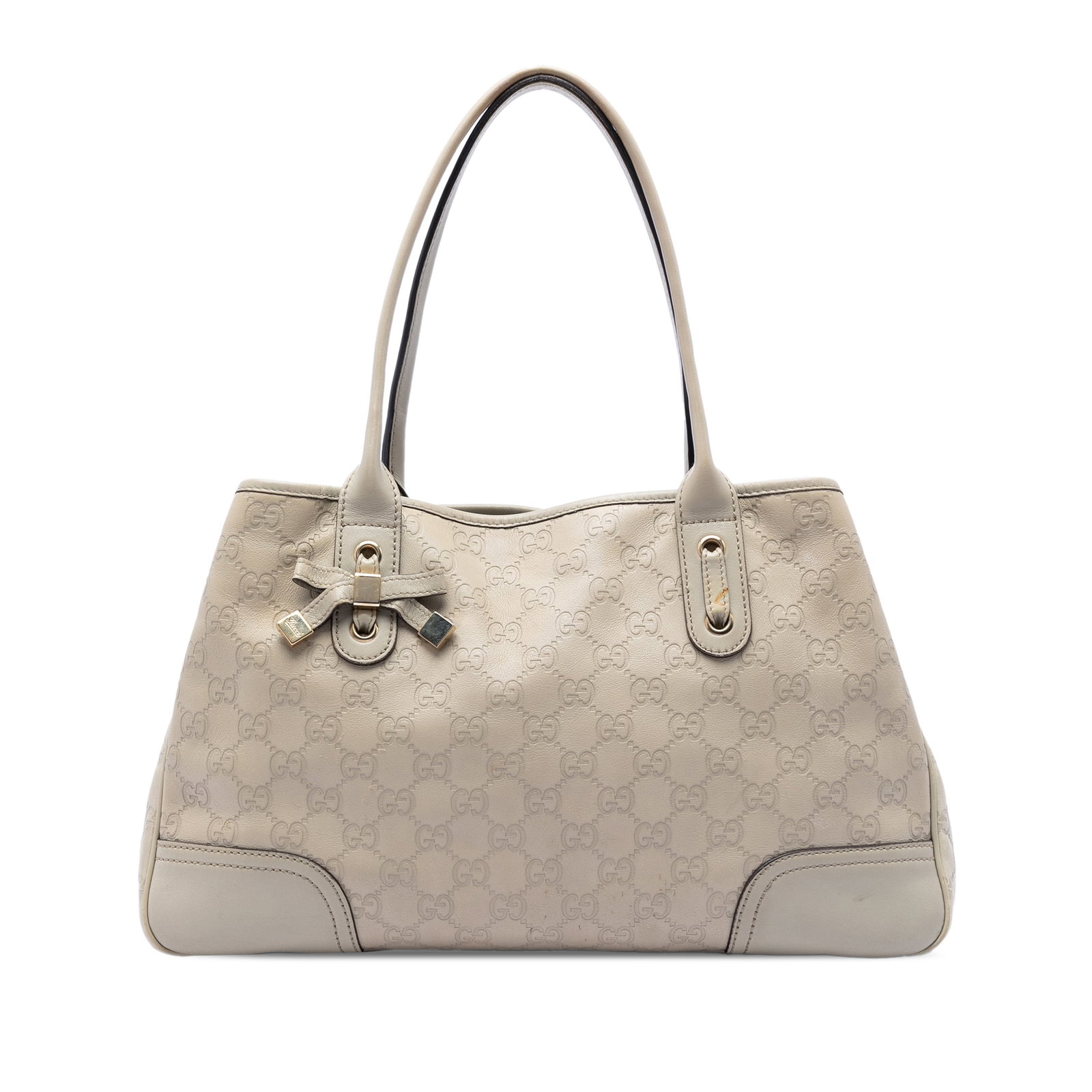 Gucci Guccissima Princy Brown Leather Tote Bag: Gucci Guccissima Princy Brown Leather Tote Bag Gucci Guccissima Princy Tote in brown embossed leather. This tote features rolled leather handles, an open top with a flap strap and snap button closure,
