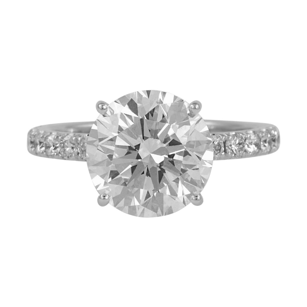 4.25ct G VS1 Round Diamond Engagement Ring 18k White Gold: 4.25ct G VS1 Round Diamond Engagement Ring 18k White Gold This stunning and classic engagement ring features a 4.25ct round brilliant cut diamond at its center, graded G color and VS1 clarity by GIA. 