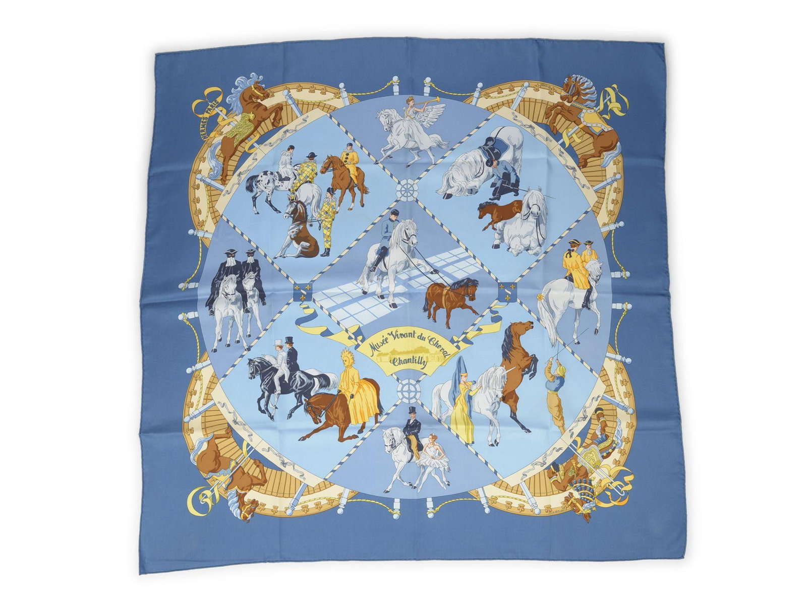 Hermes Musee Vivant du Cheval Silk Scarf with Equestrian Motifs 35 Inch: Hermes Musee Vivant du Cheval Silk Scarf with Equestrian Motifs 35 Inch This Hermes "Musee Vivant du Cheval" scarf is crafted from 100% silk and features hand rolled edges. The design showcases variou