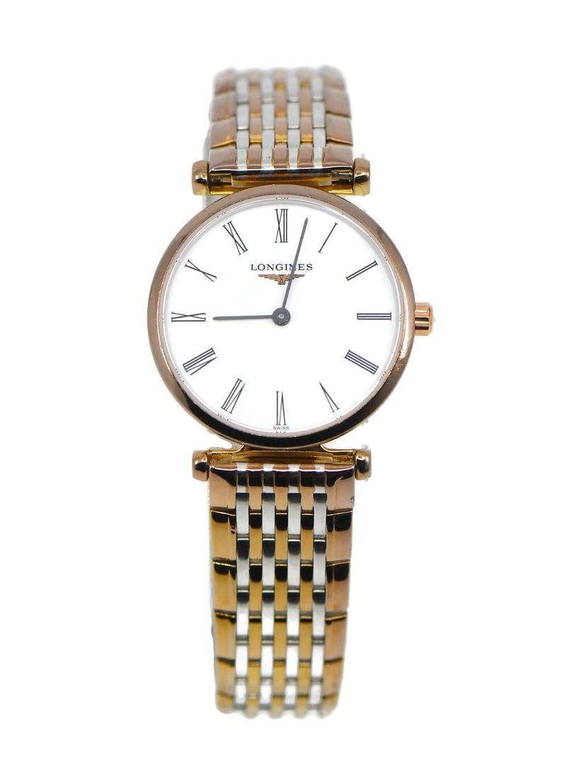 Longines La Grande two tone ladies wristwatch L4.209.1 with box: Longines La Grande two tone ladies wristwatch L4.209.1 with box This Longines La Grande wristwatch is crafted for women and features a refined two-tone stainless steel design. The watch has a smooth