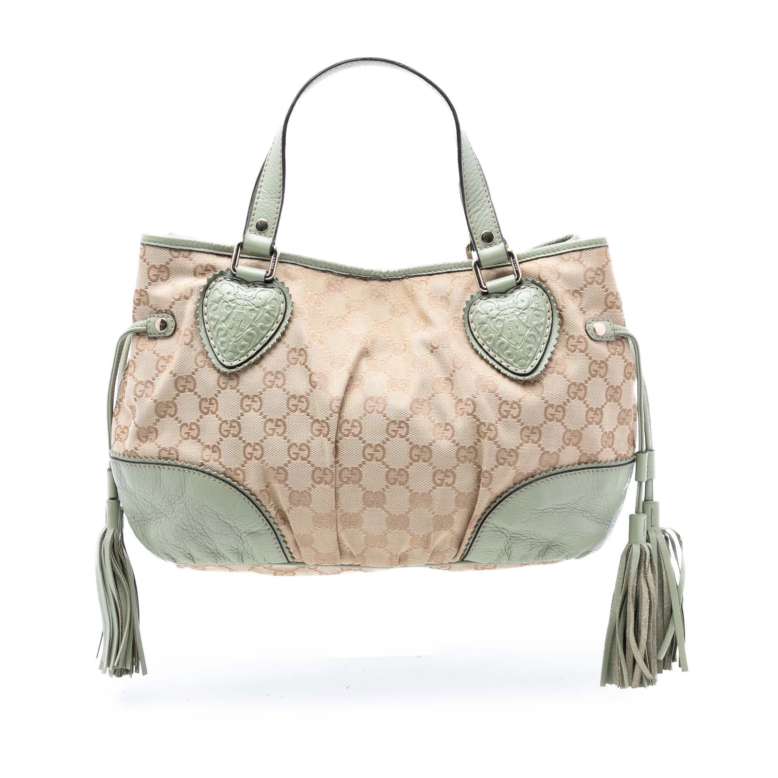 Gucci Tribeca Tote Small GG Canvas with Leather Trim and Tassel: Gucci Tribeca Tote Small GG Canvas with Leather Trim and Tassel This Gucci Small GG Canvas Tribeca Tote features a beige canvas body with leather trim, accented by side tassel details. It is designed 