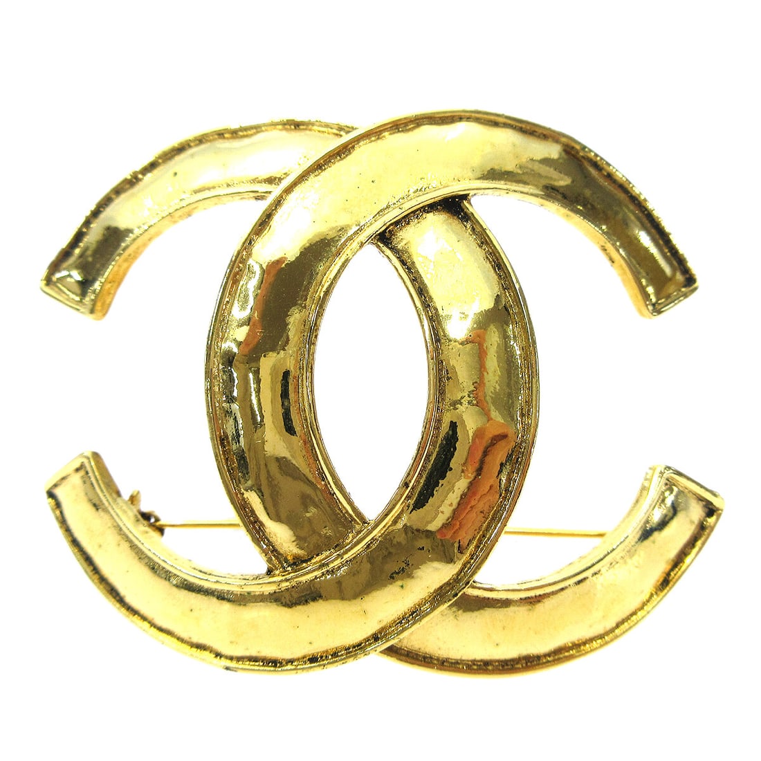 CHANEL 94P CC Logo Gold Plated Brooch Pin: CHANEL 94P CC Logo Gold Plated Brooch Pin Vintage Chanel CC brooch pin in gold-plated metal, featuring the iconic interlocking CC logo. Marked 94P and made in France, this piece shows reasonable wear 