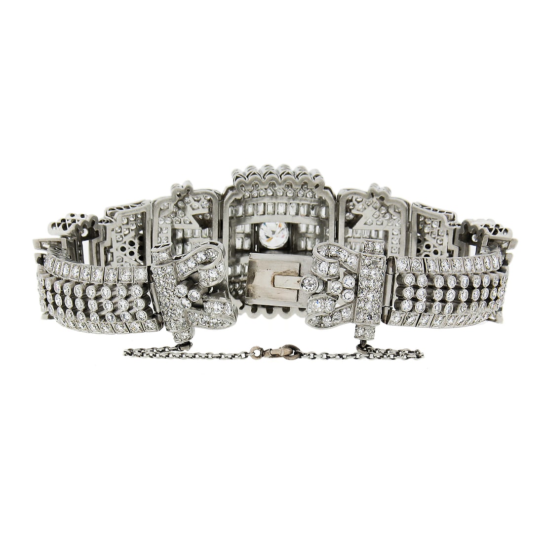 Art Deco Platinum Bracelet With Old European And Baguette Diamonds Statement Piece: Art Deco Platinum Bracelet With Old European And Baguette Diamonds Statement Piece This vintage Art Deco statement bracelet is expertly handcrafted in platinum and features an array of 79 natural diam