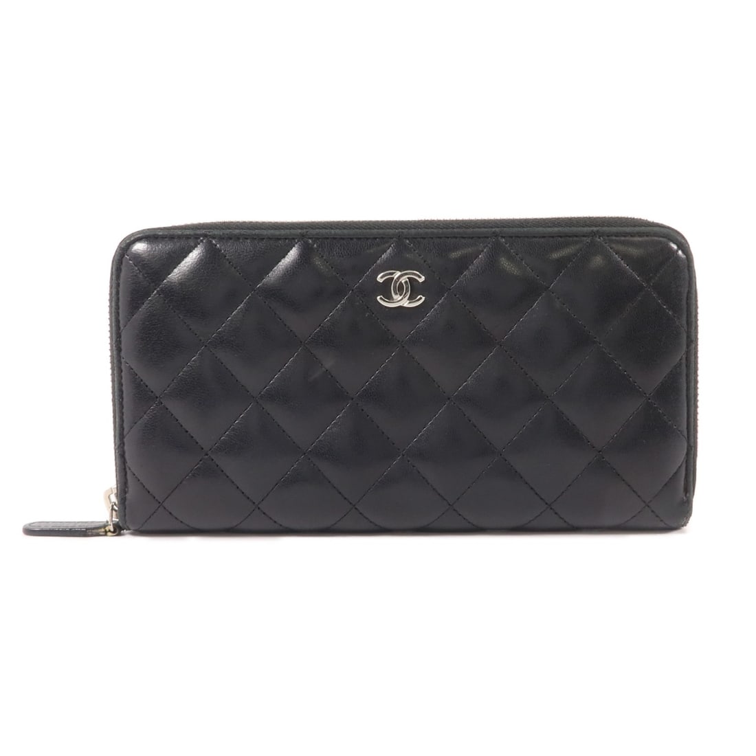 CHANEL CC SHW Lambskin Black Around Long Wallet: CHANEL CC SHW Lambskin Black Around Long Wallet This CHANEL long round wallet is crafted from luxurious black lambskin leather and features silver-tone hardware with the iconic CC logo. Designed in an