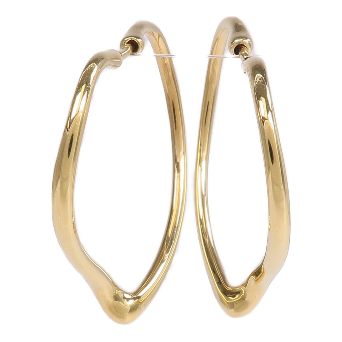 Tiffany Co Open Heart 18K Yellow Gold Hoop Earrings: Tiffany Co Open Heart 18K Yellow Gold Hoop Earrings These Tiffany & Co. Open Heart hoop earrings are crafted from 18K yellow gold, featuring a pierced design with no main stone. Designed for women, th