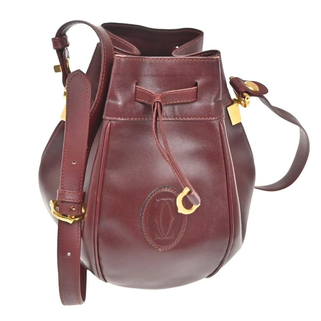 Leather Red Must de Cartier Women's Shoulder Bag 18cm x 23cm x 16cm: Leather Red Must de Cartier Women's Shoulder Bag 18cm x 23cm x 16cm This women's Must de Cartier bag features red leather construction with visible signs of wear including scuffs, dirt, stains, wrinkl