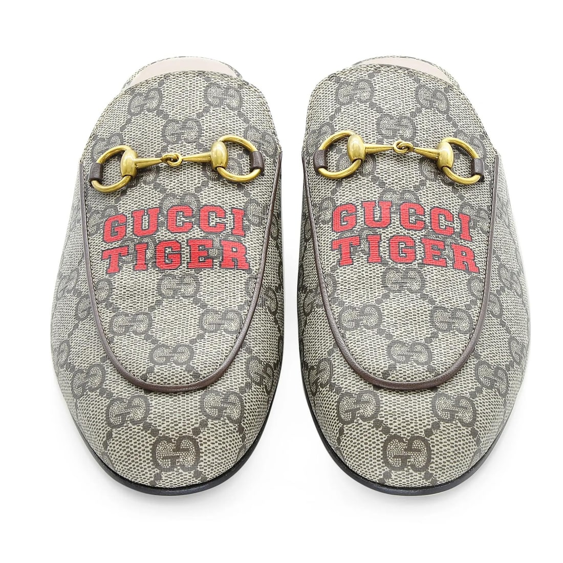 Gucci Tiger Beige GG Supreme Canvas Mule Slides Women's 37.5 US 7: Gucci Tiger Beige GG Supreme Canvas Mule Slides Women's 37.5 US 7 Step into luxury with these Gucci Tiger Beige GG Canvas Mule Slides. Designed for women, these stylish mules feature a round toe shape